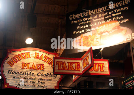 Restaurant signs hanging at Reading Terminal Market, Philadelphia, Pennsylvania. Stock Photo