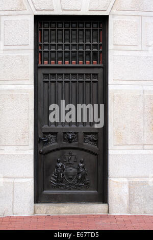 Municipal emblem of the Philadelphia municipality on an iron door/window at City Hall. Stock Photo