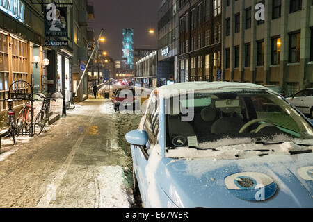 Entrance to a pub in a sidewalk covered with snow in the center of Aarhus, in Denmark, Europe Stock Photo