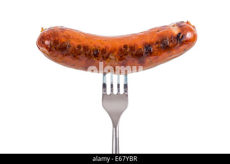 Grilled Sausage on a fork isolated on white background Stock Photo