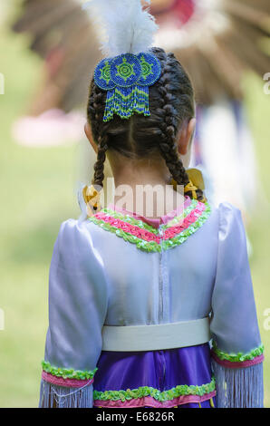 Traditional costumed Native First Nation young girl powwow pow pow dancer performer in Canim Lake, British Columbia, Canada. Stock Photo