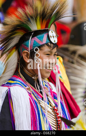 Traditional costumed Native First Nation boy powwow pow pow dancer performer in Canim Lake, British Columbia, Canada. Stock Photo