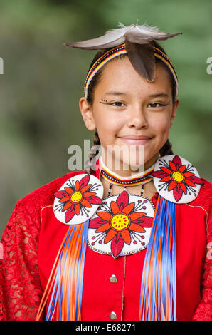 Traditional costumed Native First Nation girl powwow pow pow dancer performer in Canim Lake, British Columbia, Canada. Stock Photo