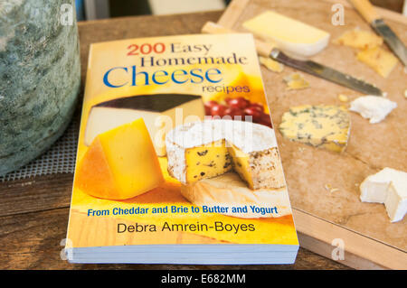 Cheeses cheese cookbook cutting board at Farm House Natural Cheeses factory, Agassiz, British Columbia, Canada. Stock Photo