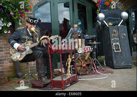 Ichabod Steam's Animatronic Steampunk Band street performer entertaining people on the street during Brecon Jazz Festival 2014 Stock Photo