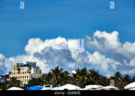 Blue clouds and dramatic white clouds on South Beach on Ocean Drive, Miami in Florida USA Stock Photo