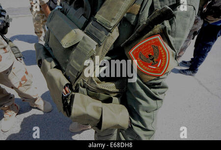 Al Quosh, Iraq. 18th Aug, 2014. Peshmergas leave Al Quosh. after patrolling the areas around Mosul dam which is currently under fire from fighting between Kurdish Peshmerga forces and the Jihadists Islamic State. Credit:  Gail Orenstein/ZUMA Wire/Alamy Live News Stock Photo