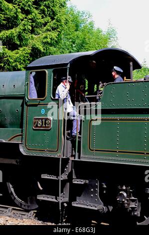 Engine drivers on the footplate of Steam Locomotive 7800, Highley, Worcestershire, England, UK, Western Europe. Stock Photo