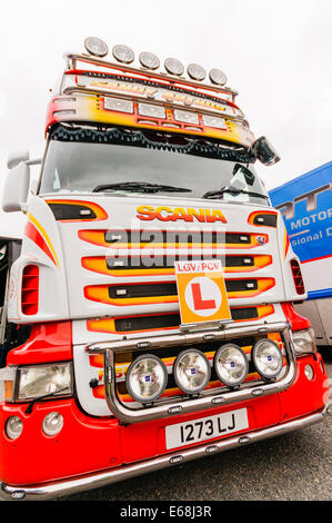 A colourful Scania semi articulated tractor cab with a learner LGV PGV badge. Stock Photo