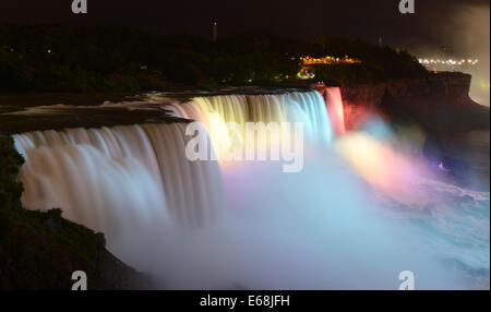 Washington, DC, USA. 16th Aug, 2014. Niagara Falls is illuminated by colorful lights near the border between the United States and Canada on Aug. 16, 2014. Credit:  Yin Bogu/Xinhua/Alamy Live News Stock Photo