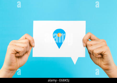 Geographic location concept on blue background Stock Photo