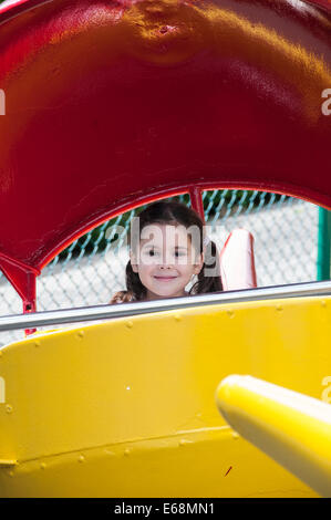 Child on a carousel Stock Photo