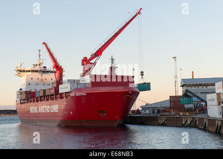The mary arctica ship of the Royal Arctic Line in the harbor of Aasiaat in Greenland loading goods Stock Photo