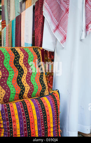 Shemagh arab scarf hijab shawl Tcholthes clothing extile Souk in Bur Dubai, Dubai, United Arab Emirates UAE. Stock Photo