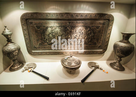 Ancient weapons axes vases tray at Miraj Islamic Art Centre Center Museum, Dubai, United Arab Emirates UAE. Stock Photo