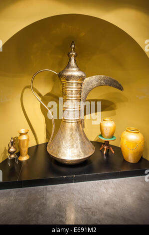 Arabic coffee urn pot at Miraj Islamic Art Centre Center Museum, Dubai, United Arab Emirates UAE. Stock Photo