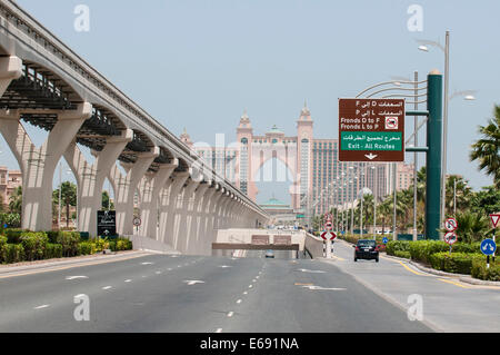 Palm Atlantis Hotel monorail highway traffic signs on the Palm, Dubai, United Arab Emirates UAE. Stock Photo