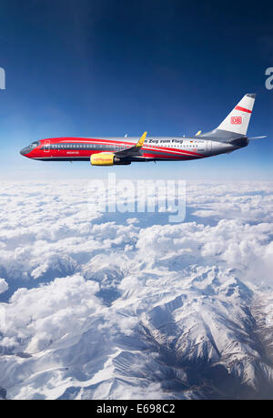 TUIfly Boeing 737-8K5 WL, with the slogan 'Im Zug zum Flug', German for 'take the train to the plane', rail and fly Stock Photo