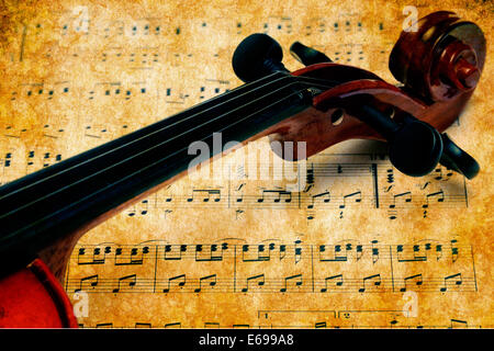 grunge violin and music sheet Stock Photo