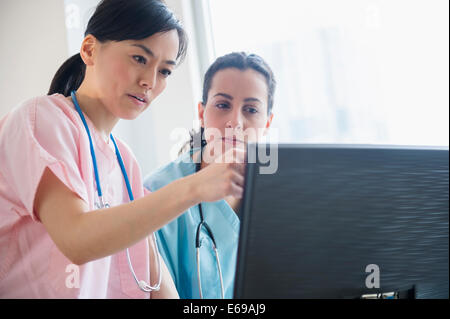 Nurses working together in hospital Stock Photo