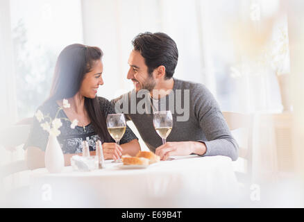 Couple having dinner together in restaurant Stock Photo