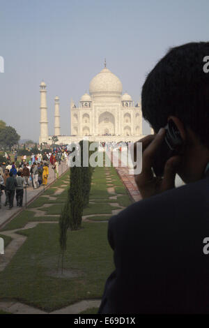 Indian businessman on cell phone by Taj Mahal, Agra, India Stock Photo