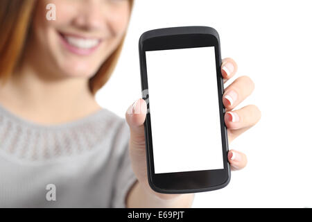 Close up of a funny woman holding a blank smart phone screen isolated on a white background Stock Photo