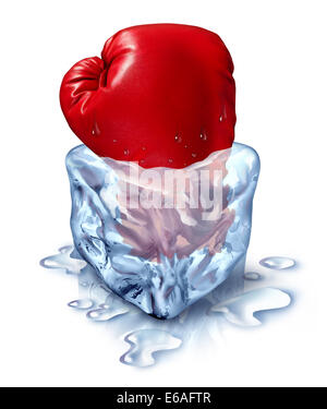 Freezing out the competition business concept as a red boxing glove in an ice cube as a metaphor for chilling out with a fresh competitor icon or frozen financial assets. Stock Photo