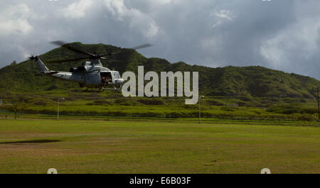 A U.S. Marine Corps UH-1Y Venom helicopter assigned to Marine Aircraft Group 24 takes off during the Rim of the Pacific (RIMPAC) 2014 exercise July 29, 2014, at a landing zone at Marine Corps Base Hawaii in Kaneohe, Hawaii. RIMPAC is a U.S. Pacific Fleet-