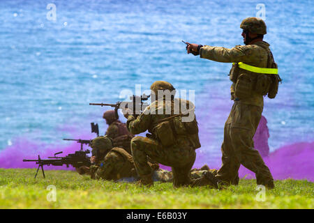 Australian soldiers with Delta Company, 5th Battalion, Royal Australian Regiment conduct a tactical live-fire demonstration during the Rim of the Pacific (RIMPAC) 2014 exercise July 29, 2014, at a range at Marine Corps Base Hawaii in Kaneohe, Hawaii. RIMP Stock Photo