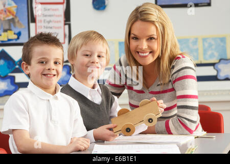 teacher,teaching,elementary student Stock Photo