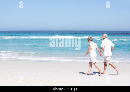 beach walking,beach holiday,older couple Stock Photo