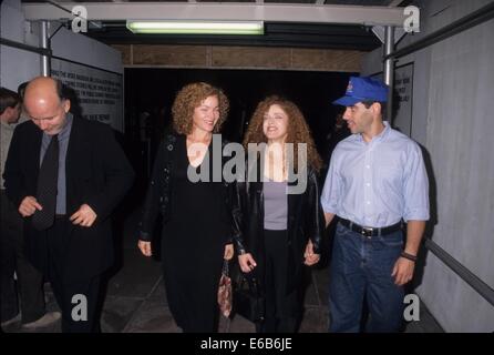 AMY IRVING with husband Bruno Barreto and Bernedette Peters at the One Tough Cop premiere after party at Grand Havana New York 1998.k13579jbb. © John Barrett/Globe Photos/ZUMA Wire/Alamy Live News Stock Photo