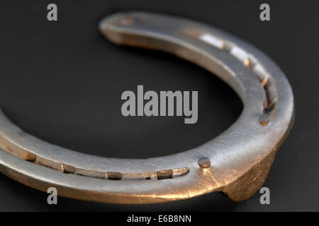 horseshoe closeup in dark back Stock Photo