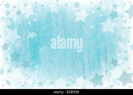 Blue or turquoise wooden christmas background with texture and white stars. Stock Photo