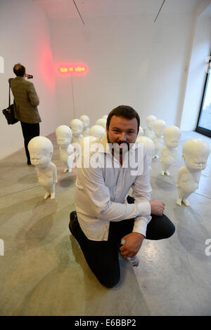 Prague, Czech Republic. 19th Aug, 2014. Slovakian artist Viktor Freso opens his exhibition Art is nice in Galerii Dvorak Sec Contemporary in Prague, Czech Republic, on Tuesday, August 19, 2014. © Roman Vondrous/CTK Photo/Alamy Live News Stock Photo