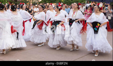 Hispanic folkloric dance group performing in Santa Fe, New Mexico, during Bandstand 2014, a celebration of music and dance. Stock Photo