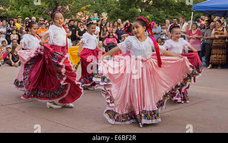 Hispanic folkloric dance group performing in Santa Fe, New Mexico, during Bandstand 2014, a celebration of music and dance. Stock Photo