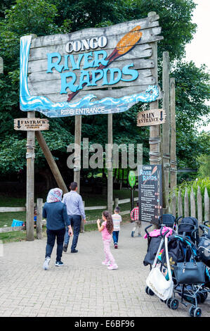 Family walking towards the Congo River Rapids ride at Alton Towers theme park Stock Photo