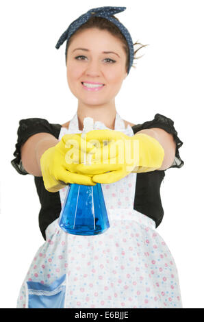 Pretty young housekeeper girl wearing apron Stock Photo
