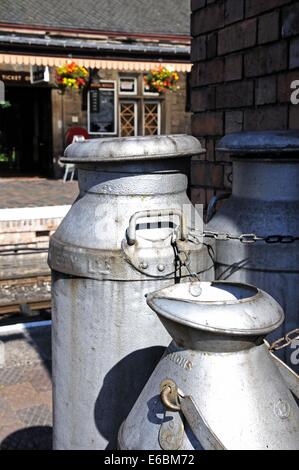 Old Retro milk churns on the railway platform, Severn Valley Railway, Bridgnorth, Shopshire, England, UK, Western Europe. Stock Photo