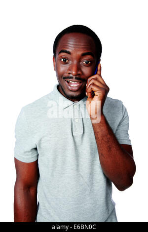 Funny african man talking on the phone isolated on a white background Stock Photo