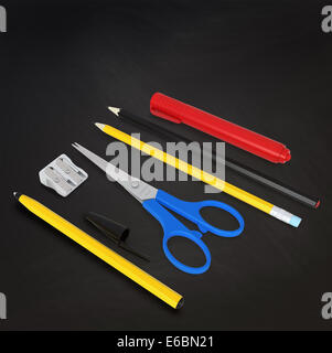 Welcome back to school set or items on office desk - 3d render on chalkboard, witch cutting path Stock Photo