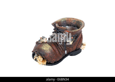 old torn boots on a white background Stock Photo