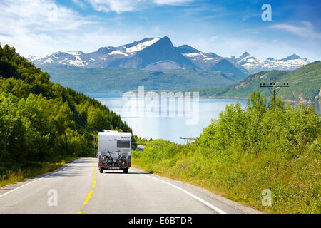 Norvegian landscape with white motorhome on the E6 road highway, Norway Stock Photo