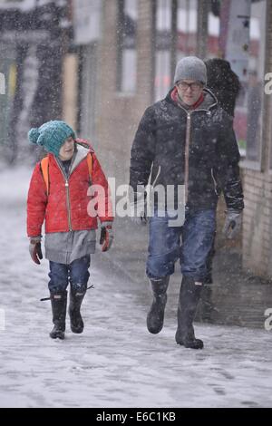 Matthew Broderick takes his children to school during a snow storm  Featuring: Matthew Broderick,Marion Broderick,Tabitha Broderick,James Broderick Where: Manhattan, New York, United States When: 03 Feb 2014 Stock Photo