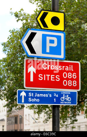 London, England, UK. Road signs in Grosvenor Square: parking; crossrail sites; cycle routes; Stock Photo