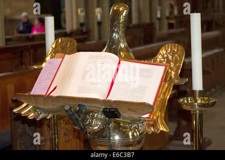 Open bible on lectern at The Minster Stock Photo