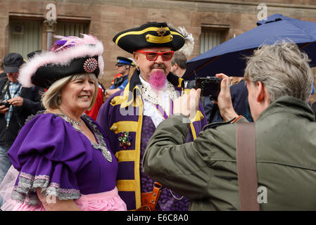 Chester, UK. 20th August, 2014. Devlin Hobson and Escort being photographed at The World Town Crier Tournament being held outside the Town Hall in Chester City Centre UK Credit:  Andrew Paterson/Alamy Live News Stock Photo