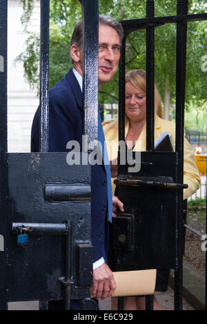 London, UK. 20th Aug, 2014. Foreign Secretary Philip Hammond MP arrives at Downing Street for talks with the PM, who cut short his Cornwall holiday, on security issues related to the execution, by a Jihadists from ISIL who had what appears to be a British accent, of American journalist James Foley. Credit:  Paul Davey/Alamy Live News Stock Photo